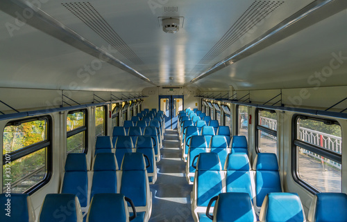 View of the interior of an electric train car without passengers