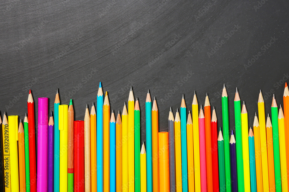 School supplies on dark background School supplies on dark background