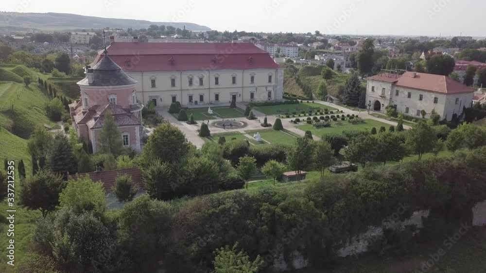 Aerial to beautiful Zolochiv Palace castle and ornamental garden in Lviv region, Ukraine.
Aerial to beautiful Zolochiv Palace castle and ornamental garden in Lviv region, Ukraine.