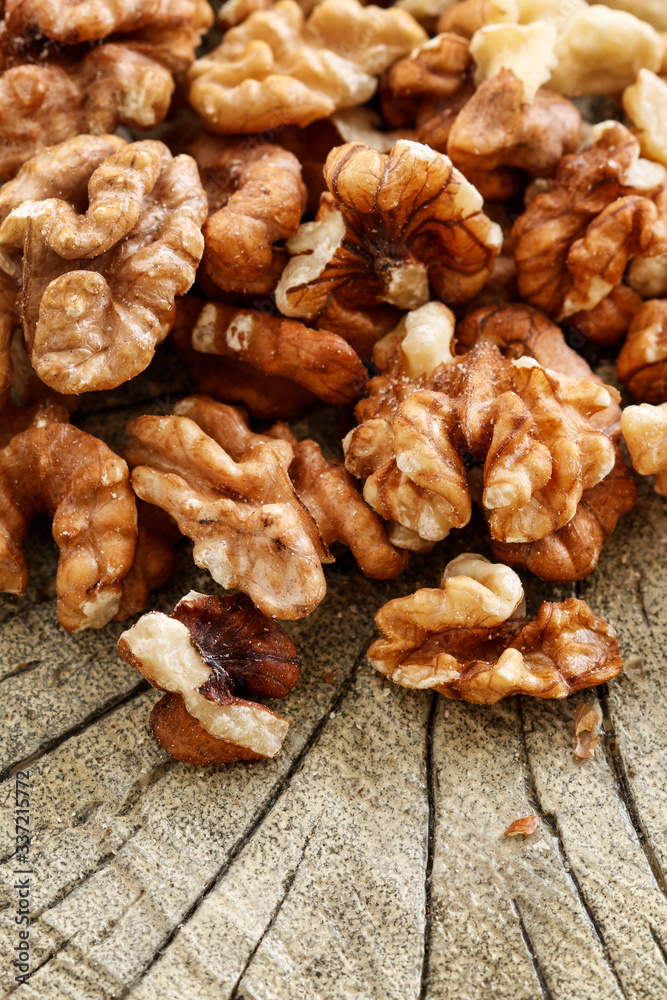 Walnuts on brown wooden background. Walnuts on brown wooden background.