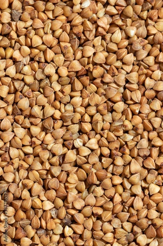 Solid background of fried buckwheat