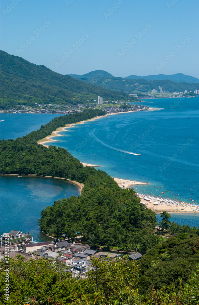 日本海の青い海と天橋立と砂浜