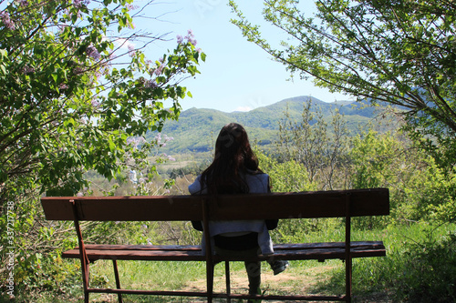 woman sitting on a bench