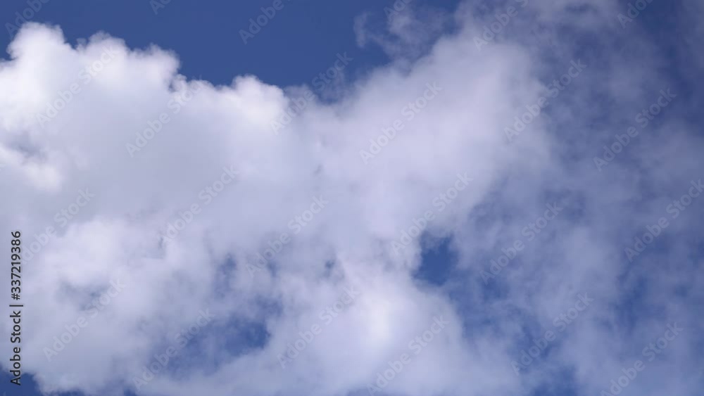 Smoke abstract. Smoke cloud. Smoke on blu background in sun light. Smoke effect. Studio shot. Fog background. Smoke abstract. Smoke cloud. Smoke on blu background in sun light. Smoke effect. Studio shot. Fog background.