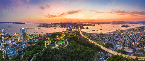 Panorama of Ha Long City, Vietnam, with Sun World Halong park and Bai Chay bridge. Near Halong Bay, UNESCO World Heritage Site. View from Cua Luc bay to Ha Long bay © Hien Phung