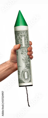 Launching the dollar economy on dollar bill rocket after the economic crisis on white background.Launch US economy. photo