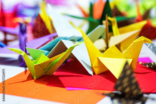 Multi-colored Arigami, paper swans, birds. A lot of multi-colored arigami.Arigami simple and easy. photo