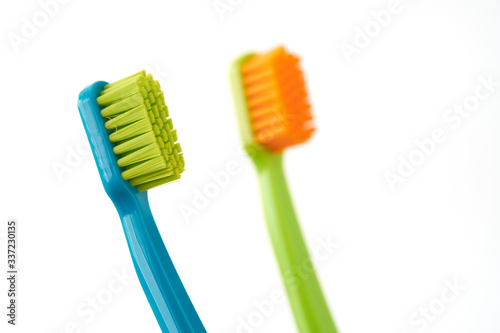 Colorful toothbrushes isolated on white background