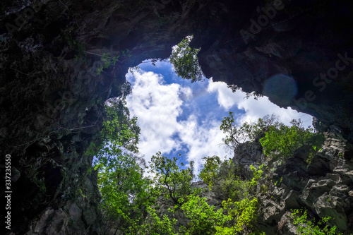Caves in limestone cliffs, Phang Nga Bay, Thailand