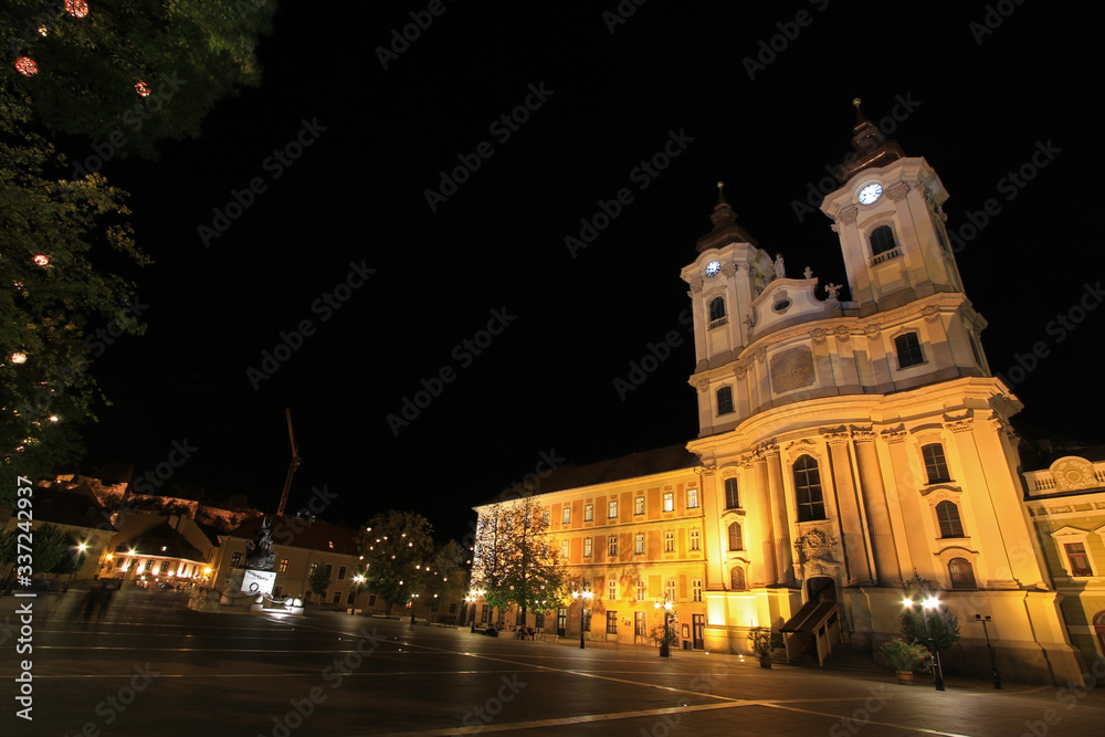 Minorite Church in Eger by night, 18th-century Baroque church in old town of Eger, Hungary
