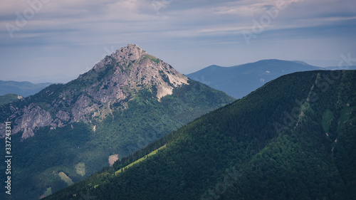 View of a rocky mountain peak in the Malá Fatra national park under a cloudy sky