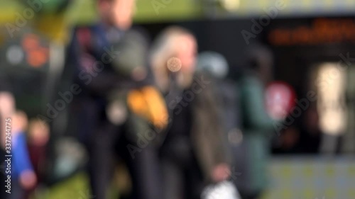 Wallpaper Mural Abstract defocused view of people in city of Manchester by trams England UK 4K Torontodigital.ca