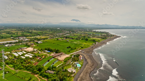 Aerial view of black sand beach. Surfing beach Bali, Indonesia.