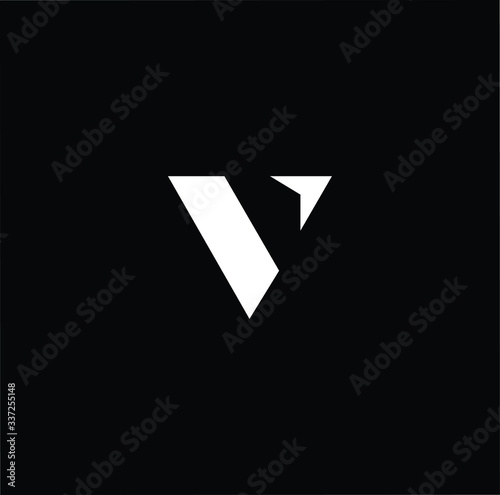 Minimal elegant monogram art logo. Outstanding professional trendy awesome artistic V initial based Alphabet icon logo. Premium Business logo white color on black background photo