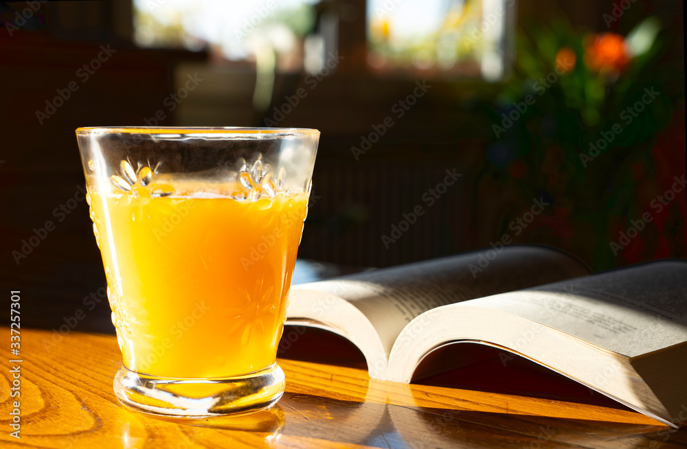 orange juice on the wooden table for breakfast orange juice on the wooden table for breakfast