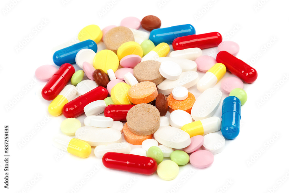 Pills, capsuleson white. Medicines and drugs.