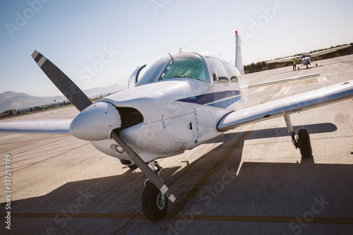 Small plane parked in an airport.