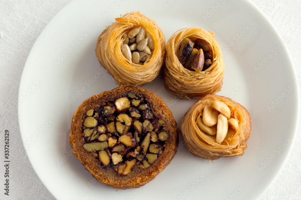 kataifi roll and nests stuffed with nuts and seeds kataifi roll and nests stuffed with nuts and seeds