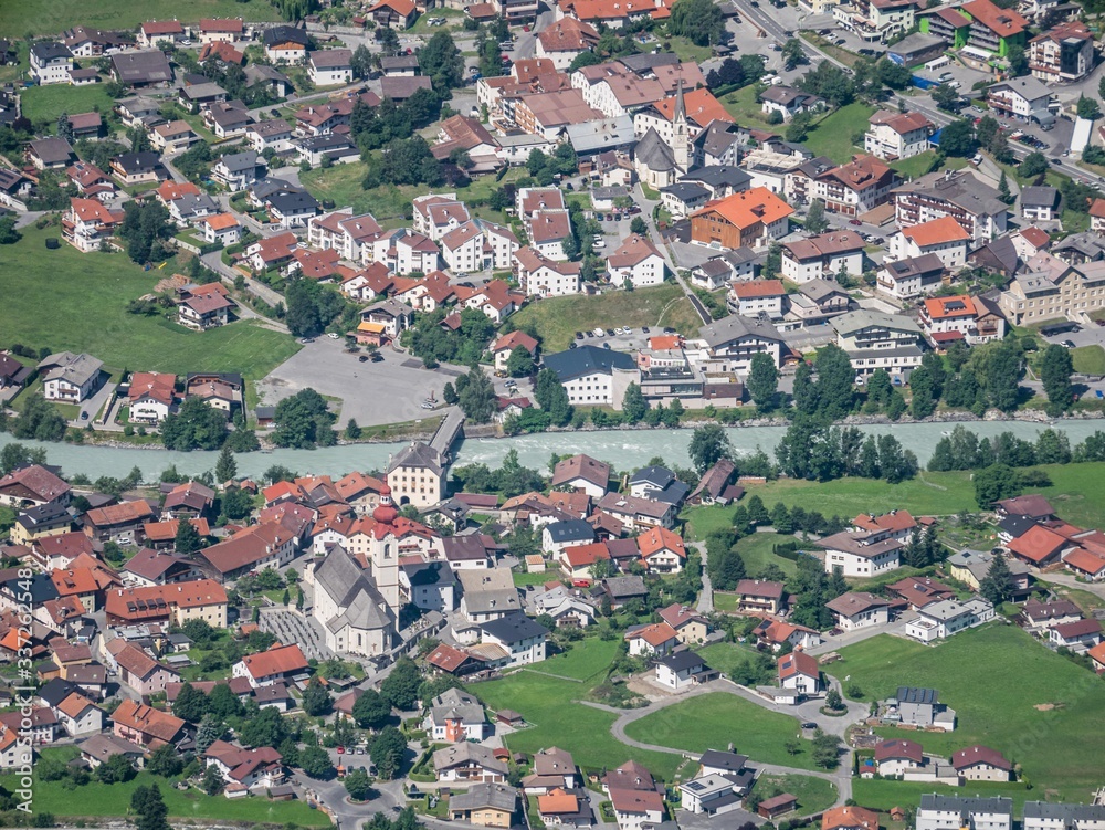 Aerial view of village Pfunds, Upper Inn Valley, Tyrol, Austria, as seen from the summit of peak Frudiger