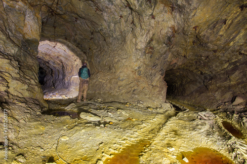 Wallpaper Mural Abandoned copper ore mine underground tunnel with miner explorer Torontodigital.ca