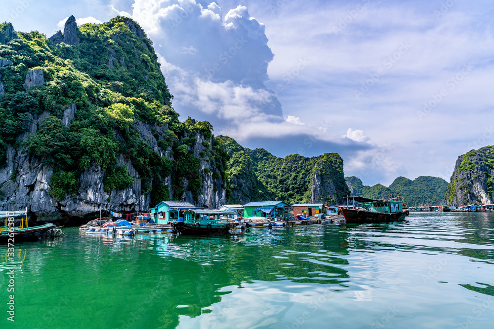 Fototapeta premium Floating fishing village and rock island in 