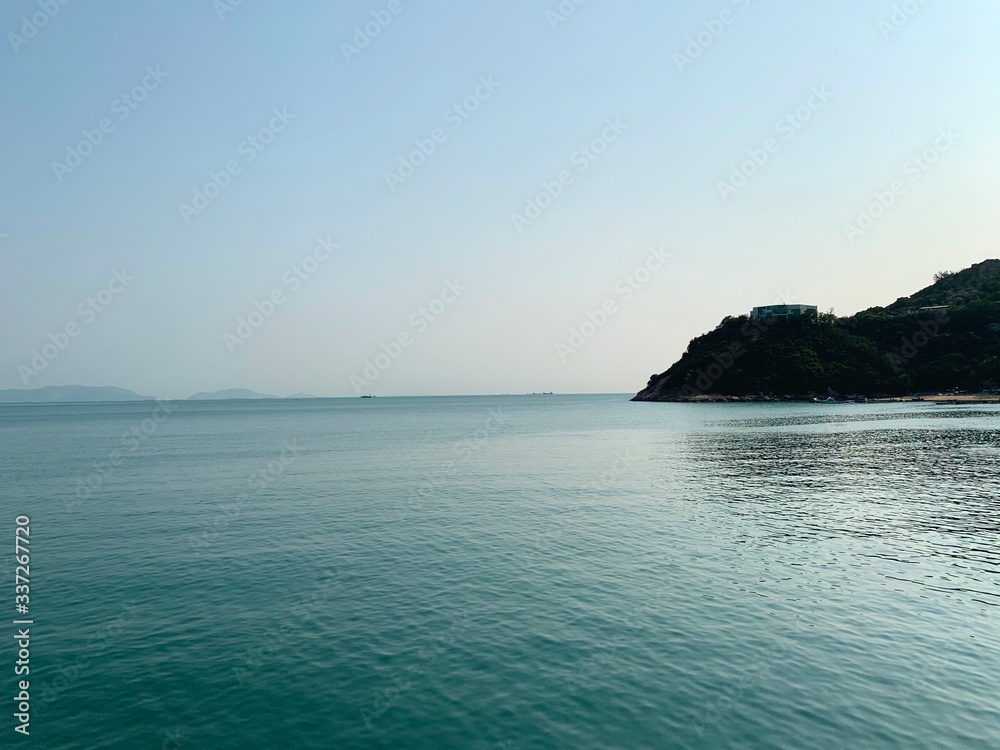 The peaceful quiet ocean sea view and the clean blue sky in hill mountain Stanley Hong Kong