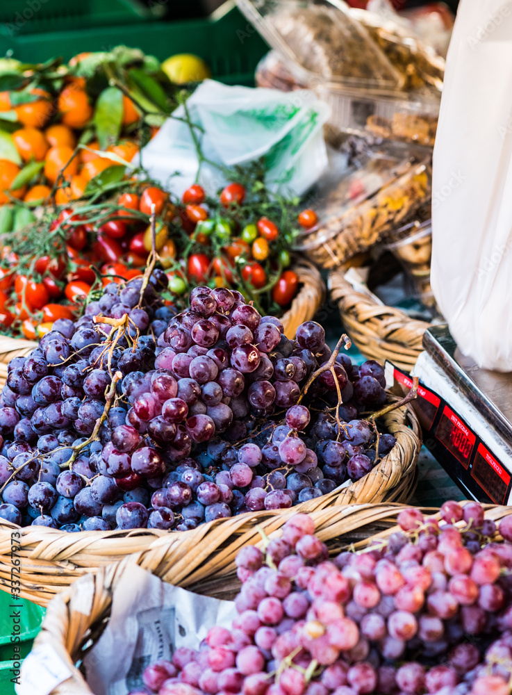 Fototapeta premium Grapes and Vegetables for sale at Beirut Market , called Souk el Tayeb