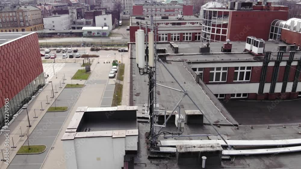 5g network mast on the roof. 4K, UHD, 50p, Cinematic,Aerial 5g network mast on the roof. 4K, UHD, 50p, Cinematic,Aerial