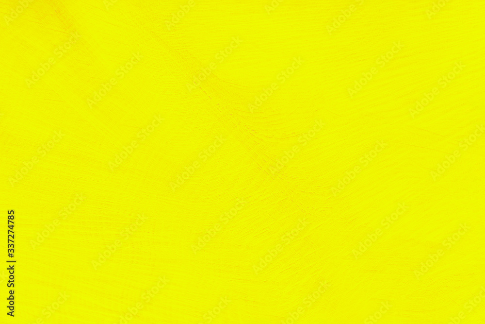 Obraz premium Vivid yellow background. Wood texture with natural pattern