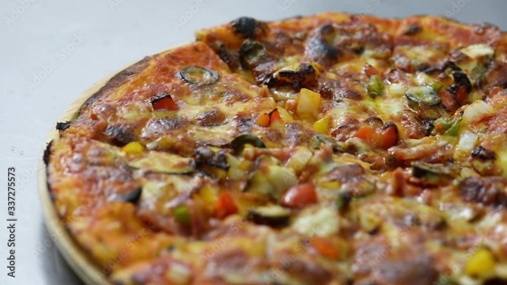 Ripe pizza prepared with seafood, cheese, tomato Sauce, Mushrooms and bell peppers is good topping. Homemade pizza in oven is best pizza . Frozen and fast food pizzas is junk food Ripe pizza prepared with seafood, cheese, tomato Sauce, Mushrooms and bell peppers is good topping. Homemade pizza in oven is best pizza . Frozen and fast food pizzas is junk food