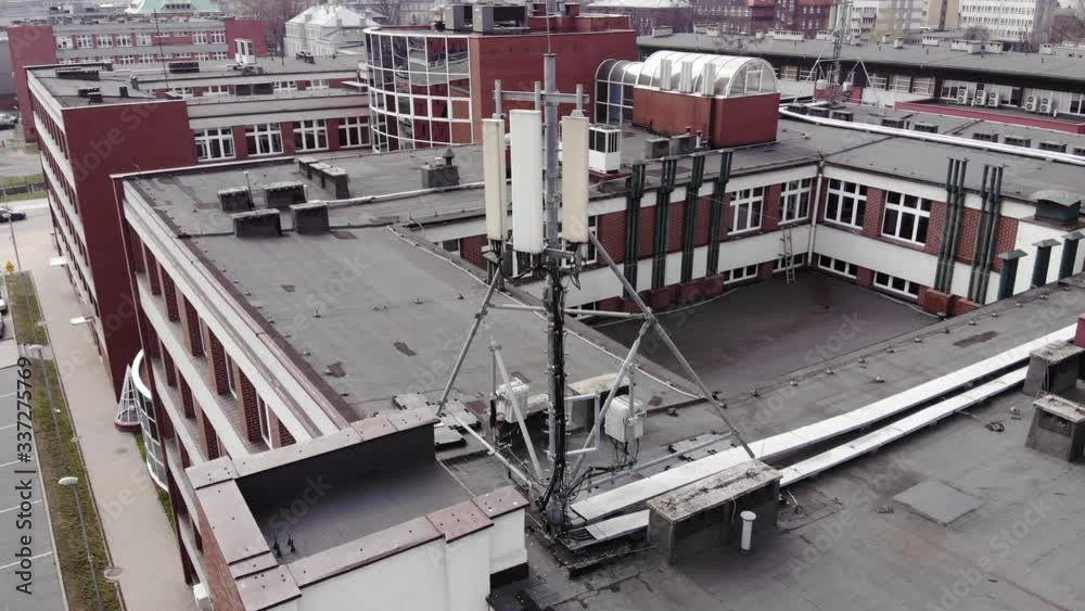 5g network mast on the roof. 4K, UHD, 50p, Cinematic,Aerial			