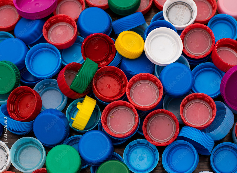 close-up colorful, plastic bottle caps close-up colorful, plastic bottle caps