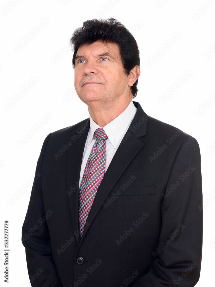 Portrait of mature handsome businessman in suit thinking Portrait of mature handsome businessman in suit thinking