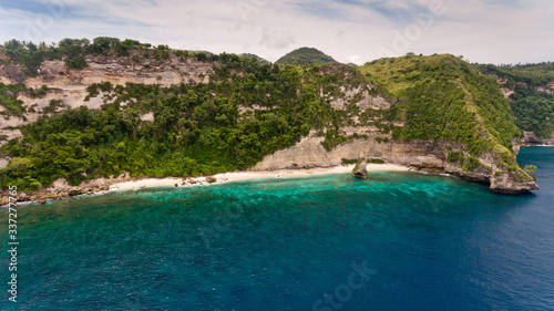 Aerial view on Pura Temple on hardly accessible deserted Suwehan beach. Nusa Penida paradise Island, Indonesia.