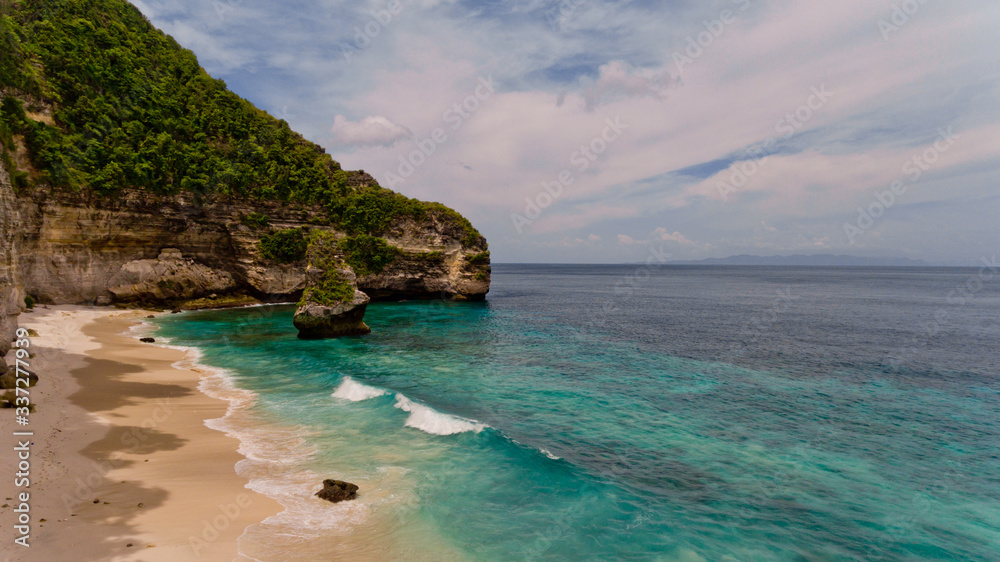 Aerial view on hardly accessible deserted Suwehan beach. Nusa Penida paradise Island, Indonesia.