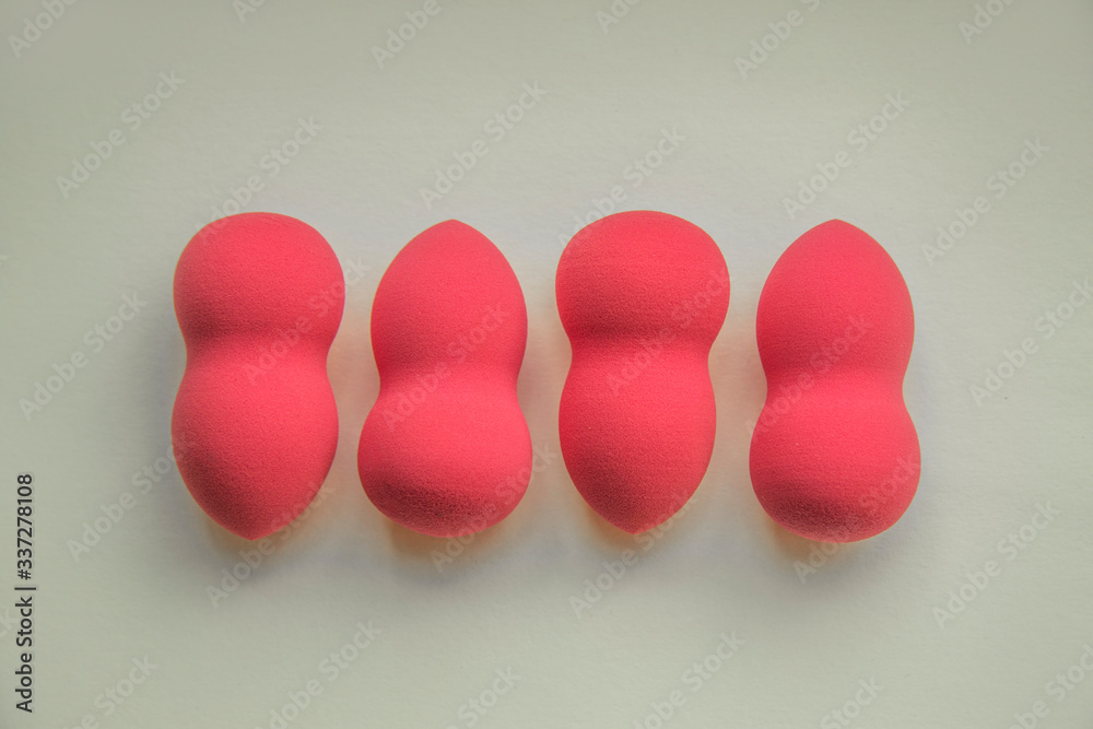 pink beauty blenders on a white background pink beauty blenders on a white background