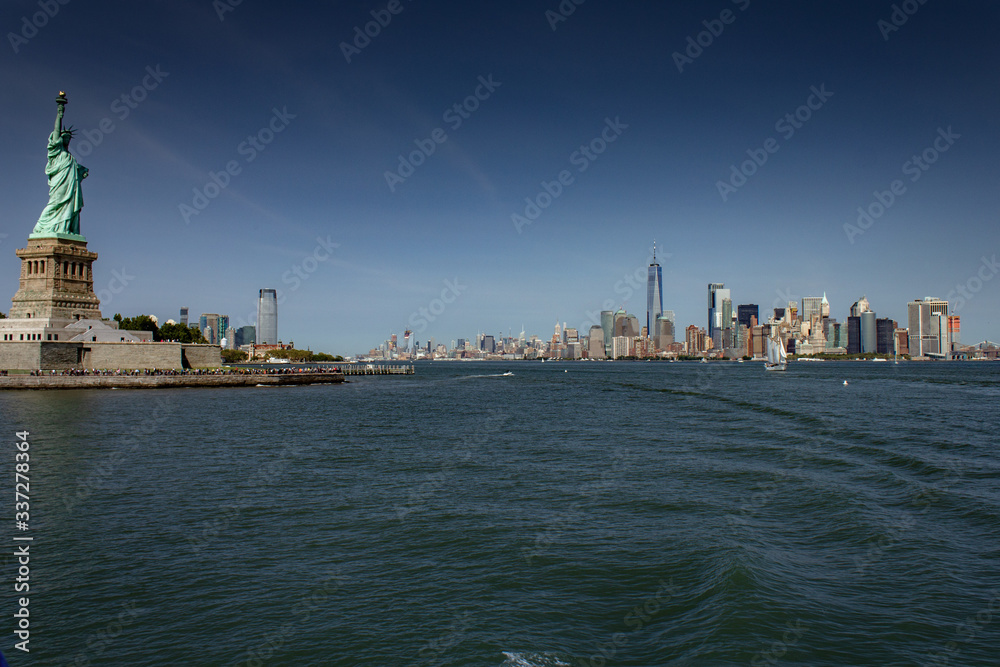 New York City skyline in summer with blue sky