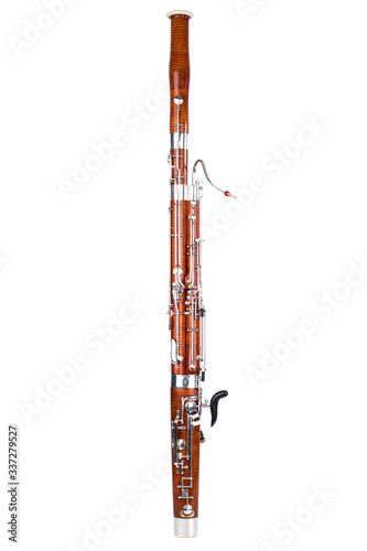 Wooden bassoon isolated on a white background. Music instruments.