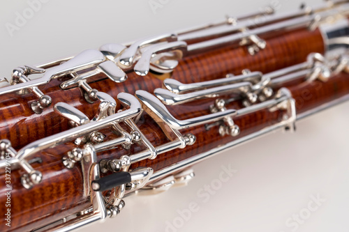 Wooden bassoon isolated on a white background. Music instruments.