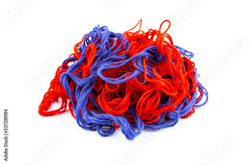 red and blue threads on a white background