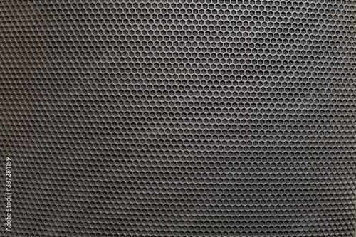Sound speaker mesh texture composed of hexagons for background