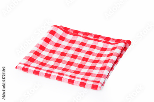 Red checkered tablecloth folded in two isolated on white background