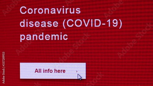 Coronavirus disease (COVID-19) pandemic web page closeup. Clicking the button All info here on computer screen