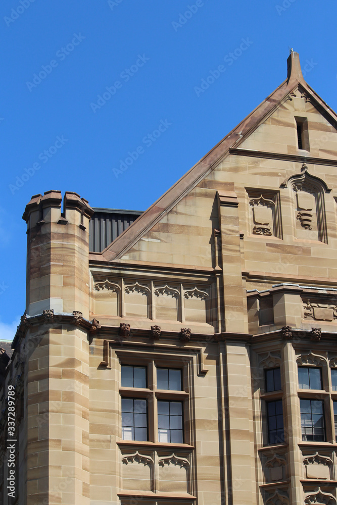 Fototapeta premium A sandstone building in the city. The building is Registrar-General's building also known as Land Titles Office. 1 Prince Albert Rd, Sydney. 