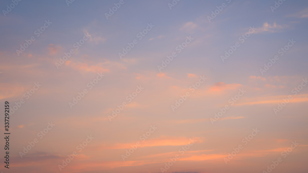 pink pastel clouds blurred at sunset blue sky. abstract photo, background image.