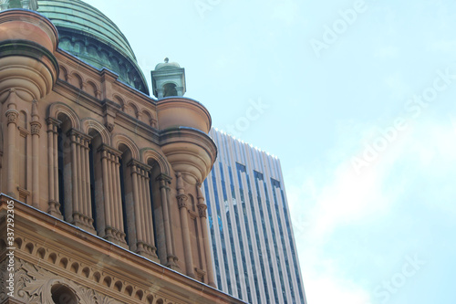 Photography In the foreground is a close up detailing parts of the historic Queen Victoria Building