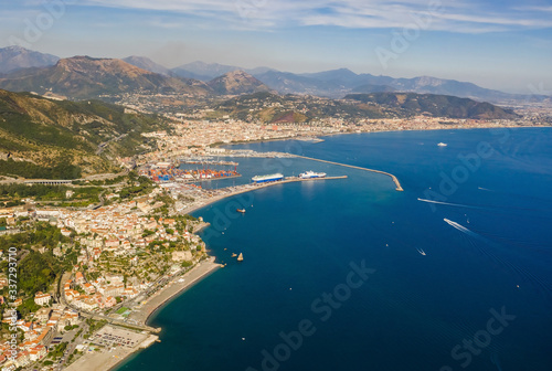 Aerial view to Vietri sul Mare and Salerno city and mountains, Italy. Beatuful view from above to the sea and landscape. Big and small ships near town and city.