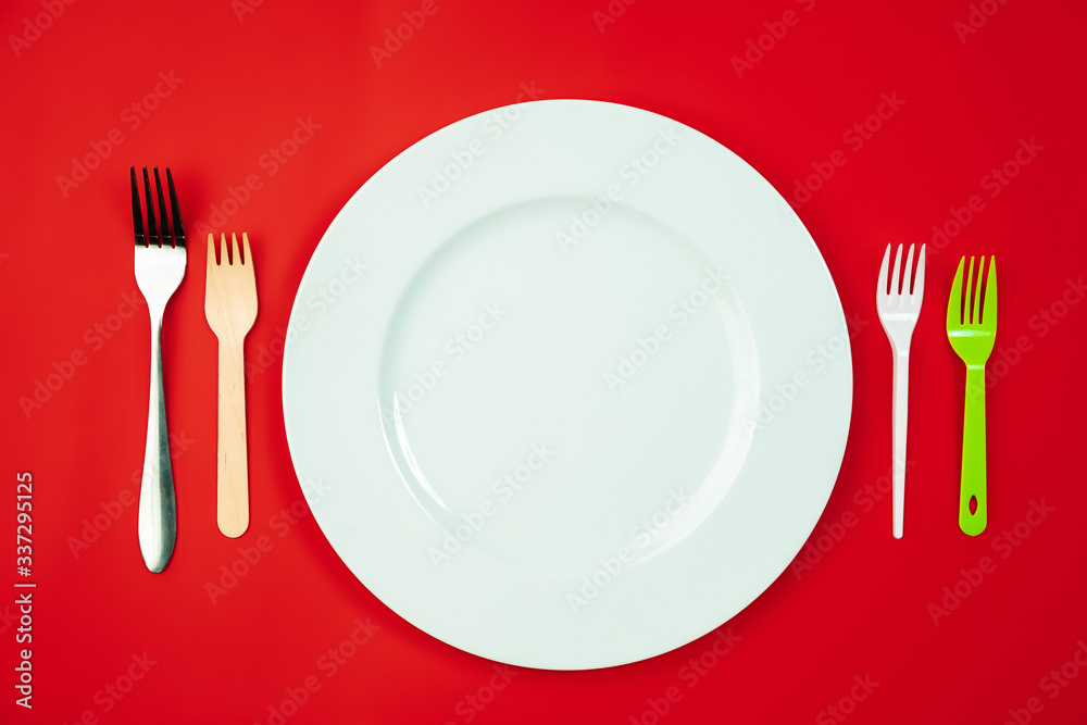 Cutlery and plate. Eco-friendly life - organic made recycle kitchenware in compare with polymers, plastics analogues. Home style, natural products for recycle and not harmful to the environment and Cutlery and plate. Eco-friendly life - organic made recycle kitchenware in compare with polymers, plastics analogues. Home style, natural products for recycle and not harmful to the environment and