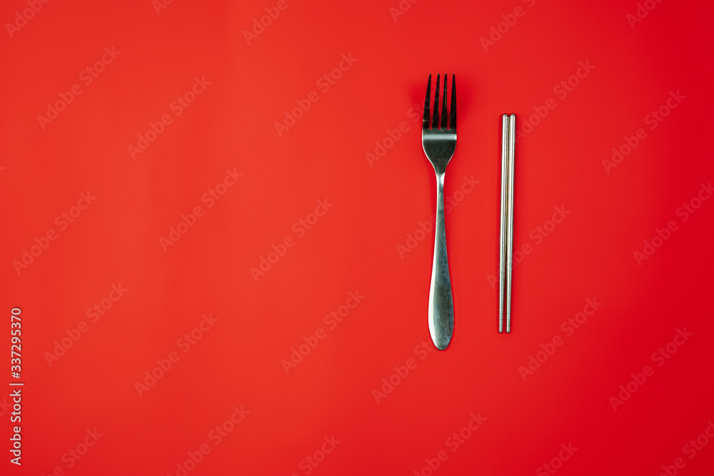 Fork and chopsticks. Eco-friendly life - organic made houseware in compare with polymers, plastics analogues. Home style, natural products for recycle and not harmful to the environment and health. Fork and chopsticks. Eco-friendly life - organic made houseware in compare with polymers, plastics analogues. Home style, natural products for recycle and not harmful to the environment and health.