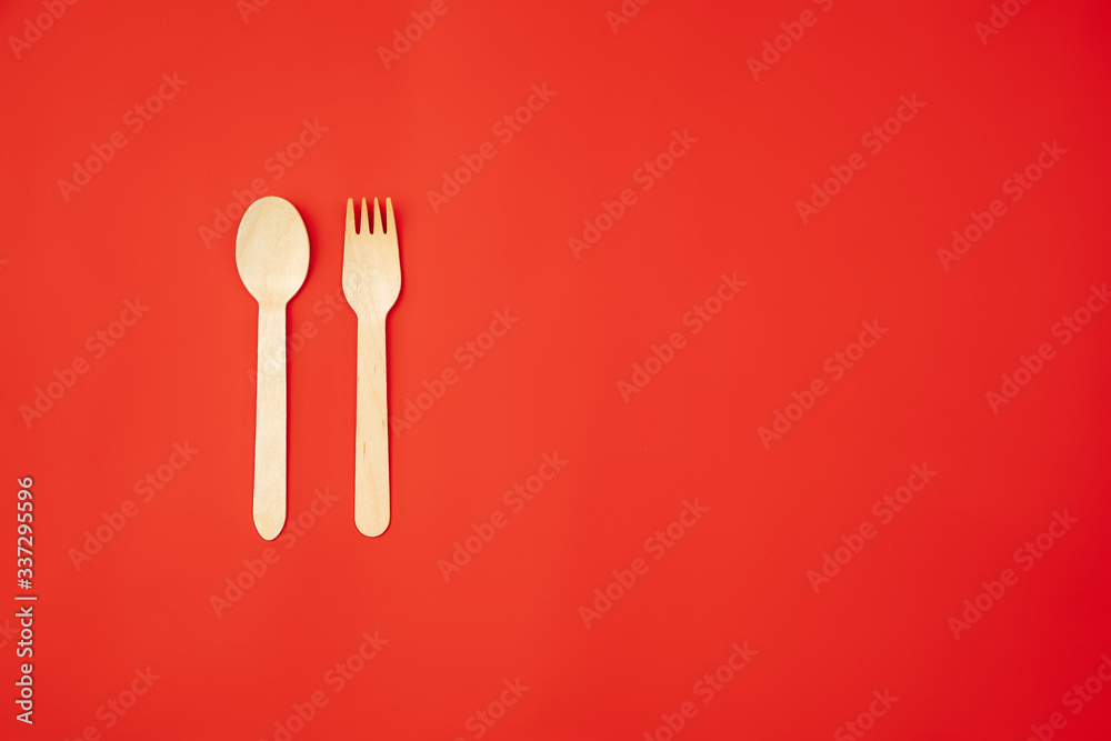 Fork and spoon. Eco-friendly life - organic made recycle houseware in compare with polymers, plastics analogues. Home style, natural products for recycle and not harmful to the environment and health. Fork and spoon. Eco-friendly life - organic made recycle houseware in compare with polymers, plastics analogues. Home style, natural products for recycle and not harmful to the environment and health.